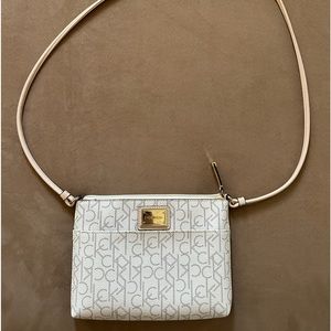 CK crossbody purse used.